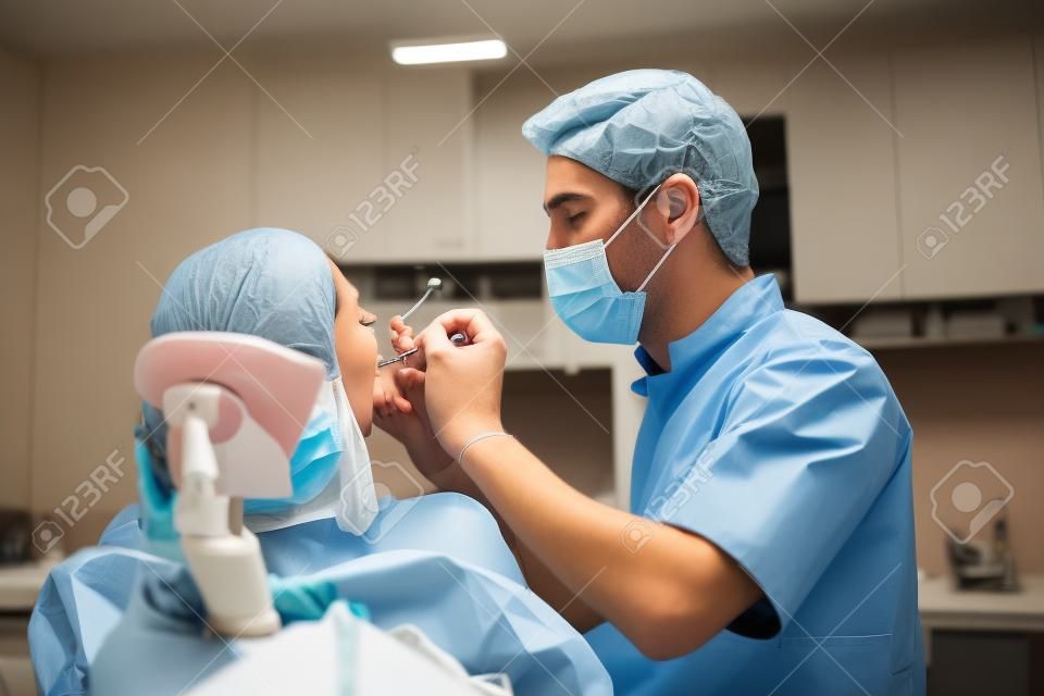Caucasian male dentist examining young woman patients teeth at dental clinic. Doctor probing teeth with dental instrument using an explorer look for cavities treatment and checking problems