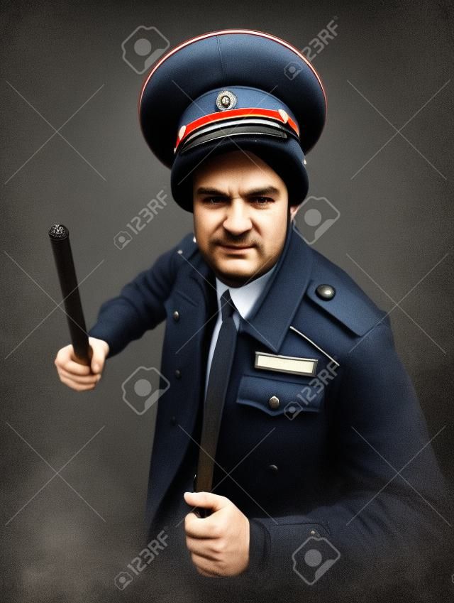 a man in a Russian police uniform with a baton. English translation of " Police"
