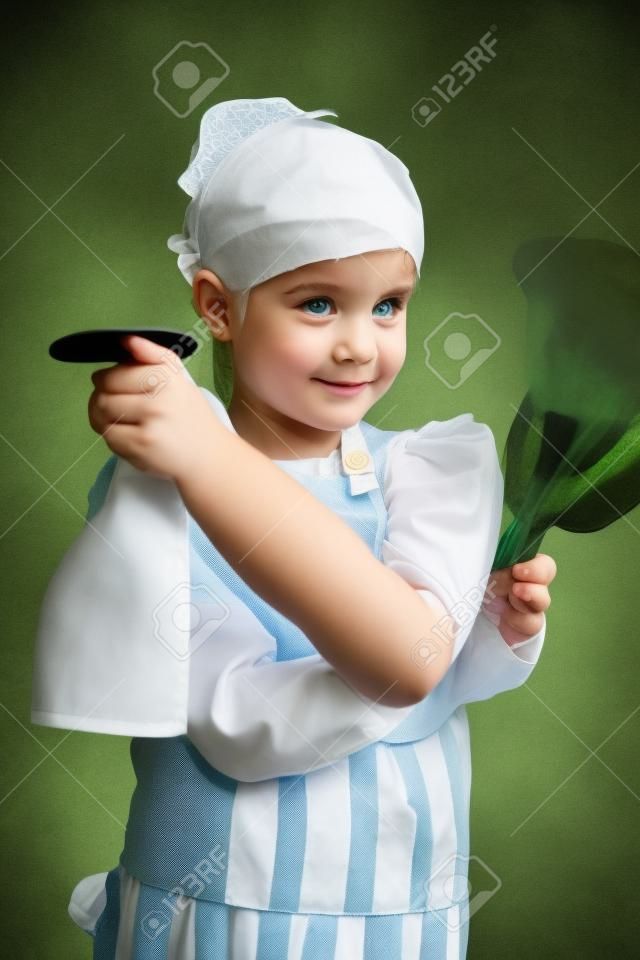 A little girl dressed as a maid 