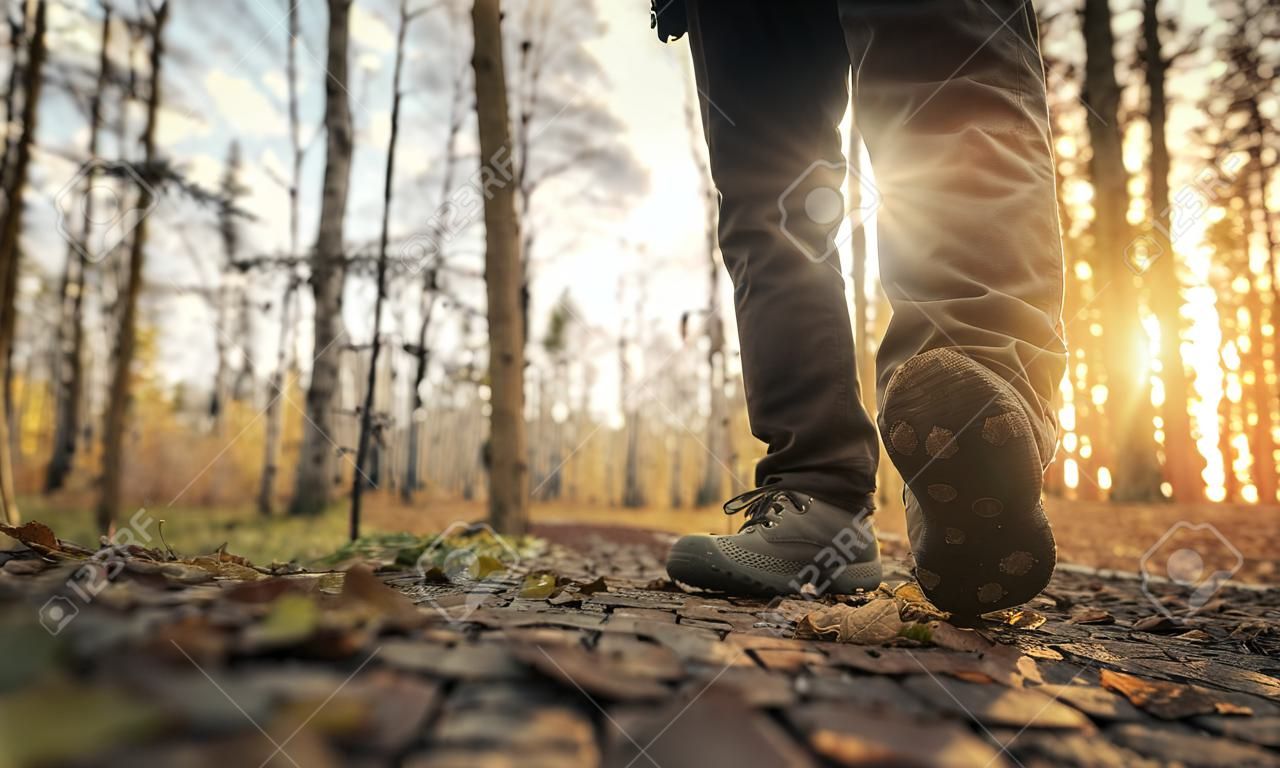 mens foot steps in the woods
