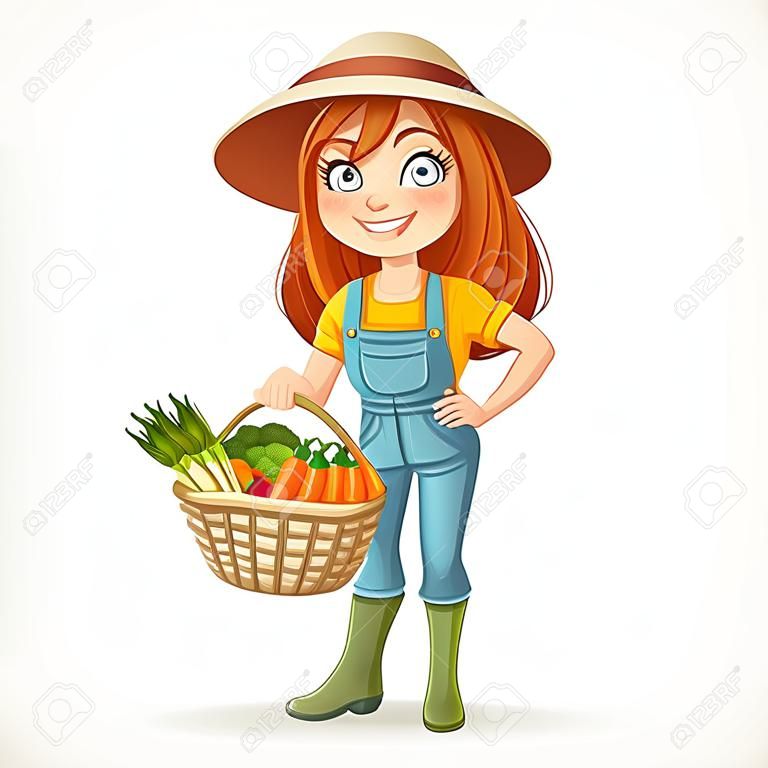 Симпатичный молодой фермер девушка с большой корзиной овощей, изолированных на белом фоне