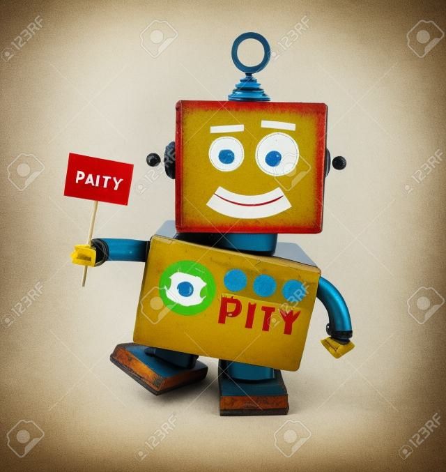 Poco robot feliz juguete de la vendimia con un cartel del partido sobre fondo blanco