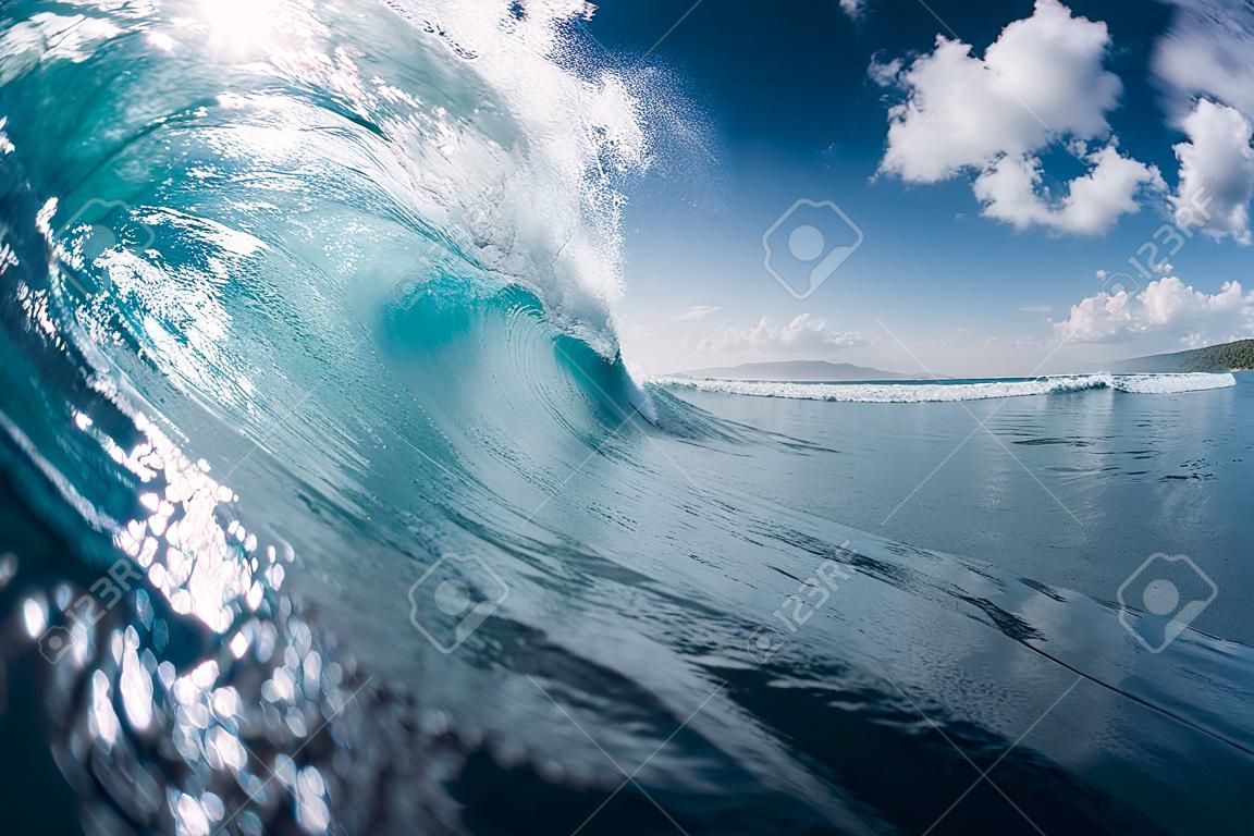 Blue barrel wave in ocean. Breaking wave
