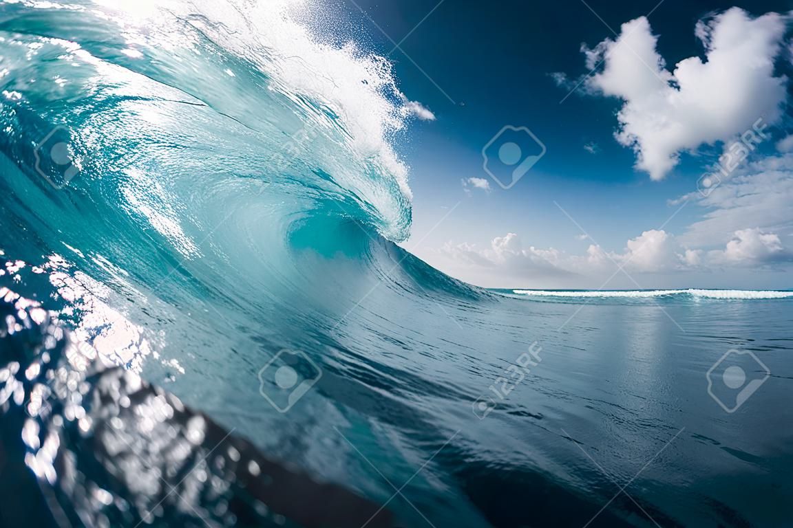 Blue barrel wave in ocean. Breaking wave