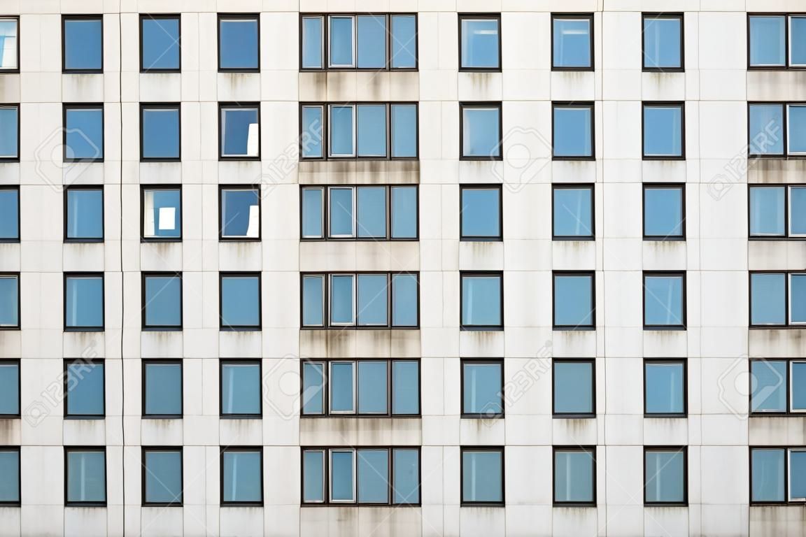 Multiple closed windows on a large office building