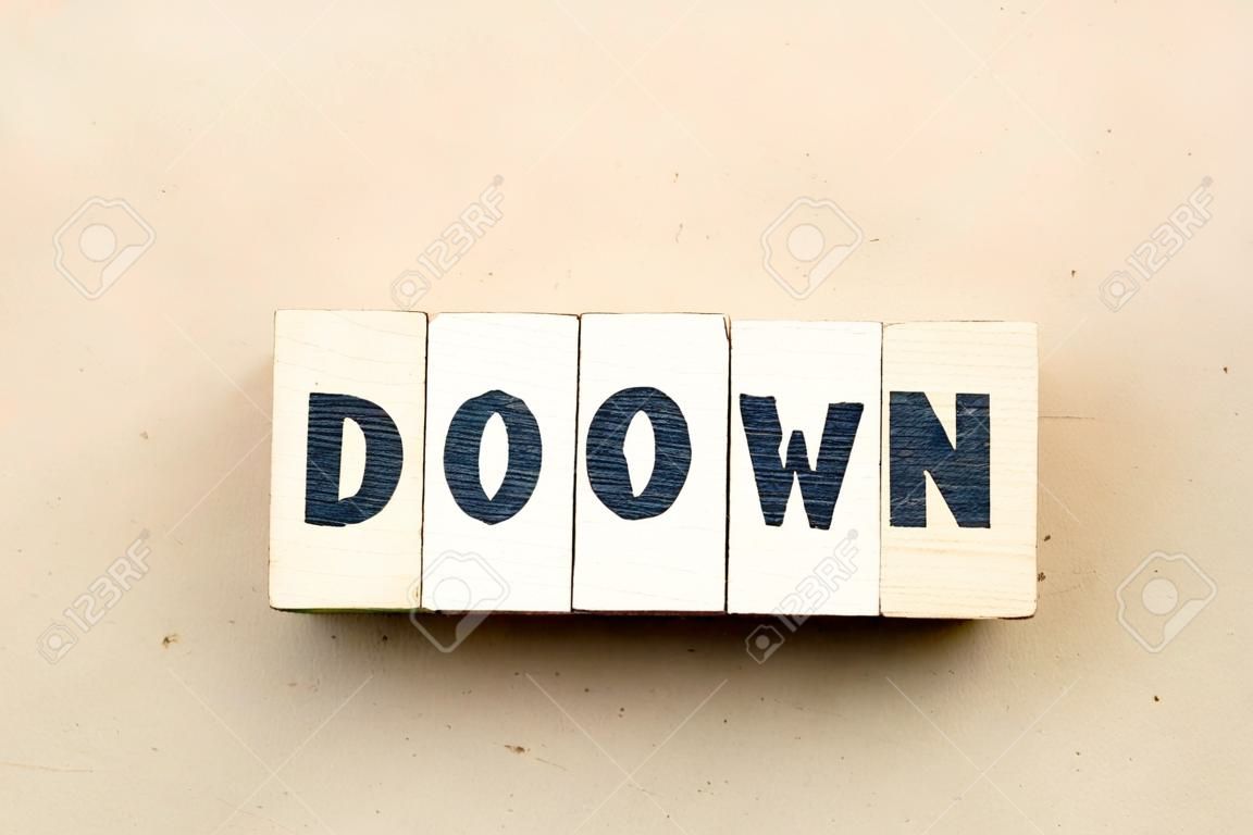 Alphabet letter block in word down on wood background