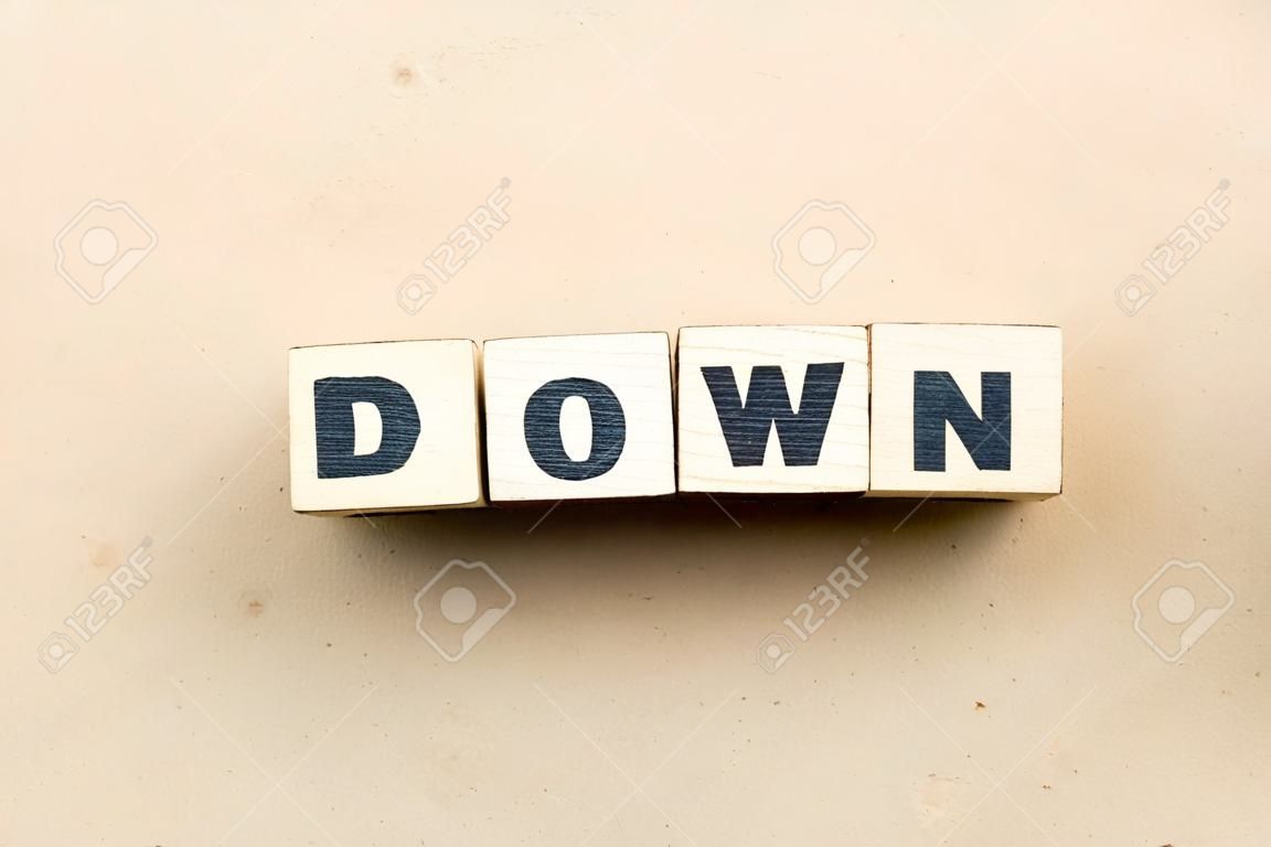 Alphabet letter block in word down on wood background