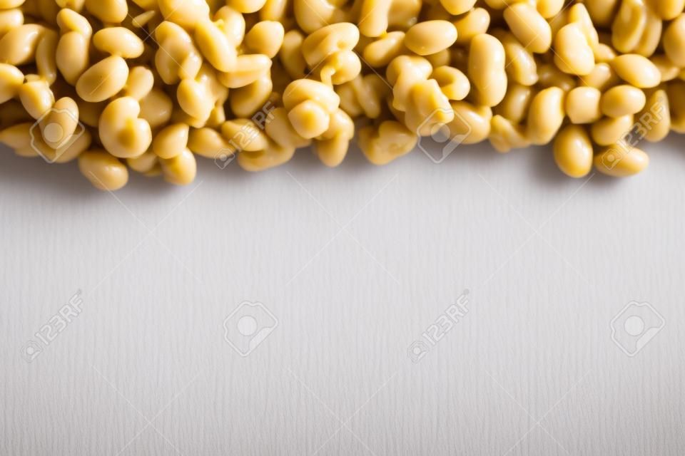 Natto. Fermented soybeans frame isolated on white background