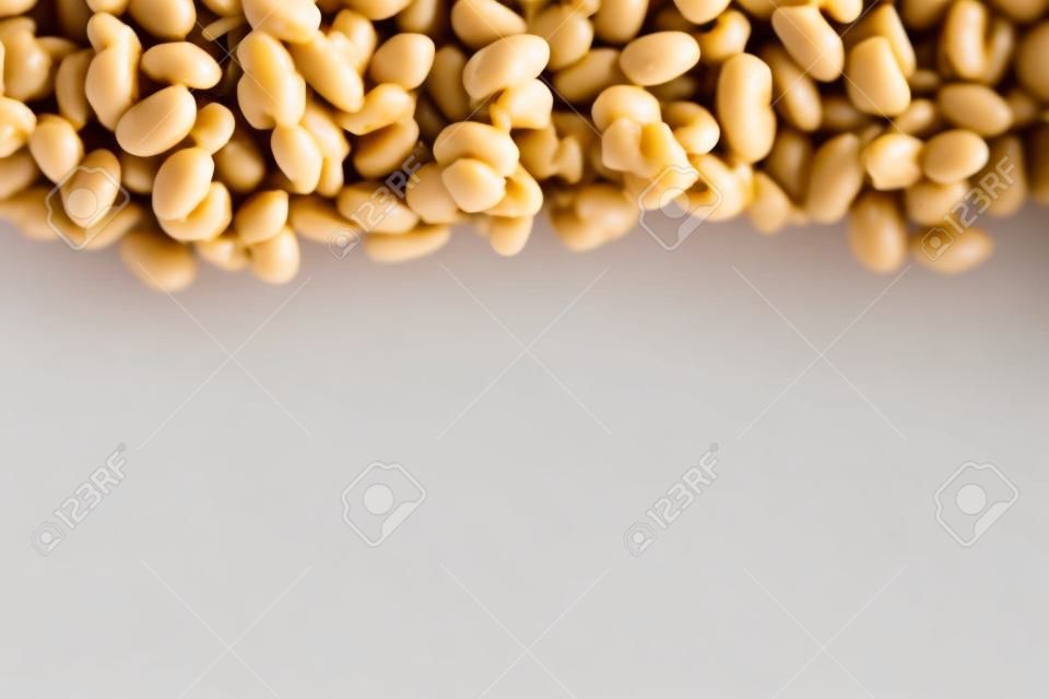 Natto. Fermented soybeans frame isolated on white background