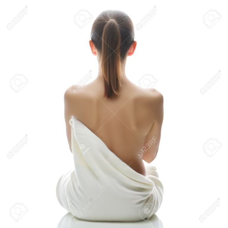 Young beautiful woman wering towel - spa concept