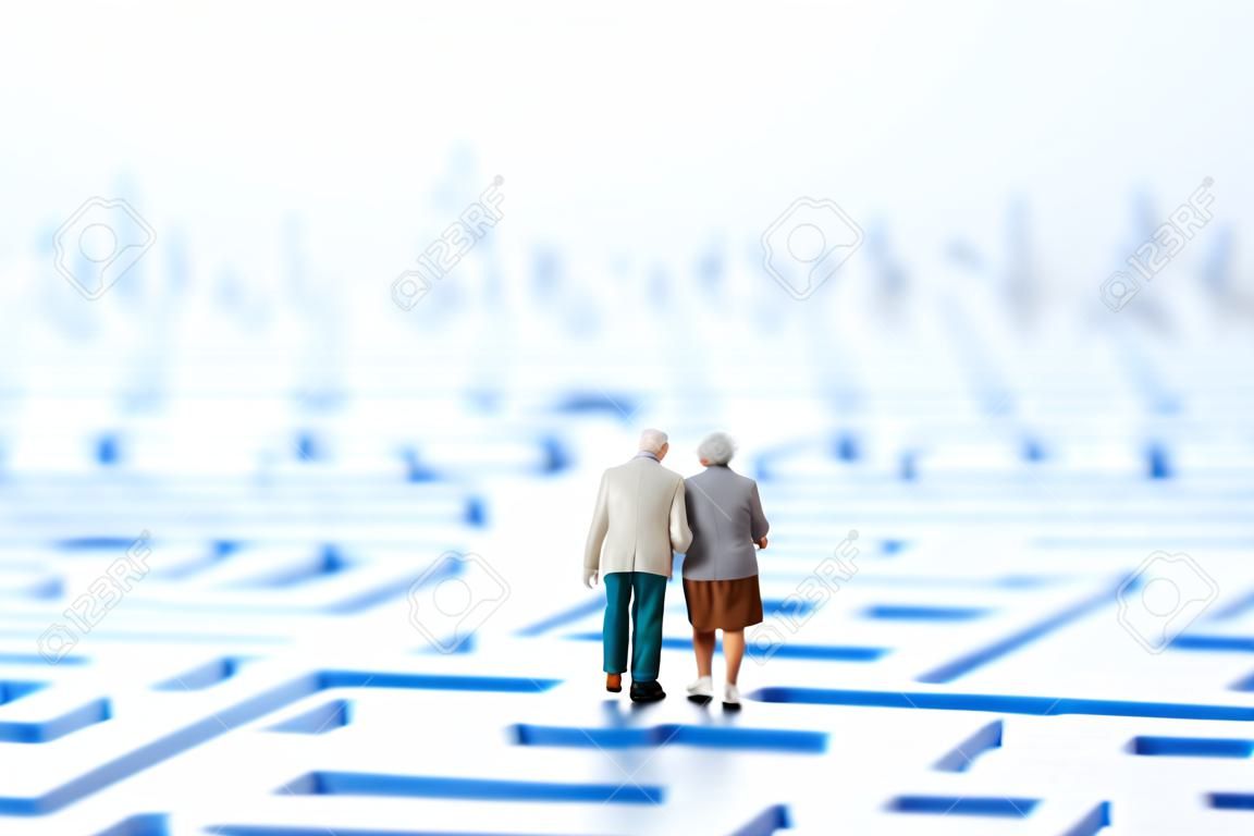 Couple of elderly walk through the maze
