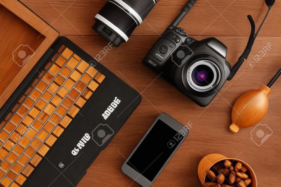 Digital camera on wooden table