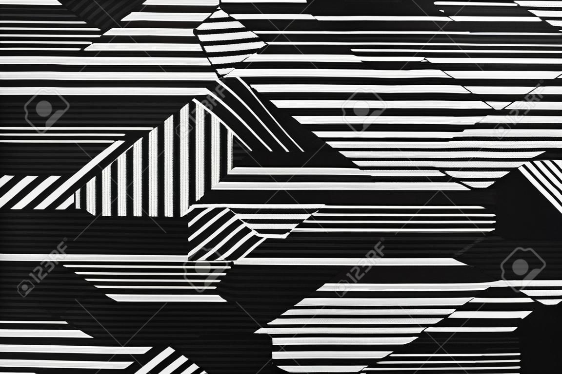 Tekstura tkaniny z abstrakcyjnymi liniami. Tkanina tło z czarno-białymi liniami. Streszczenie czarno-białe tło.