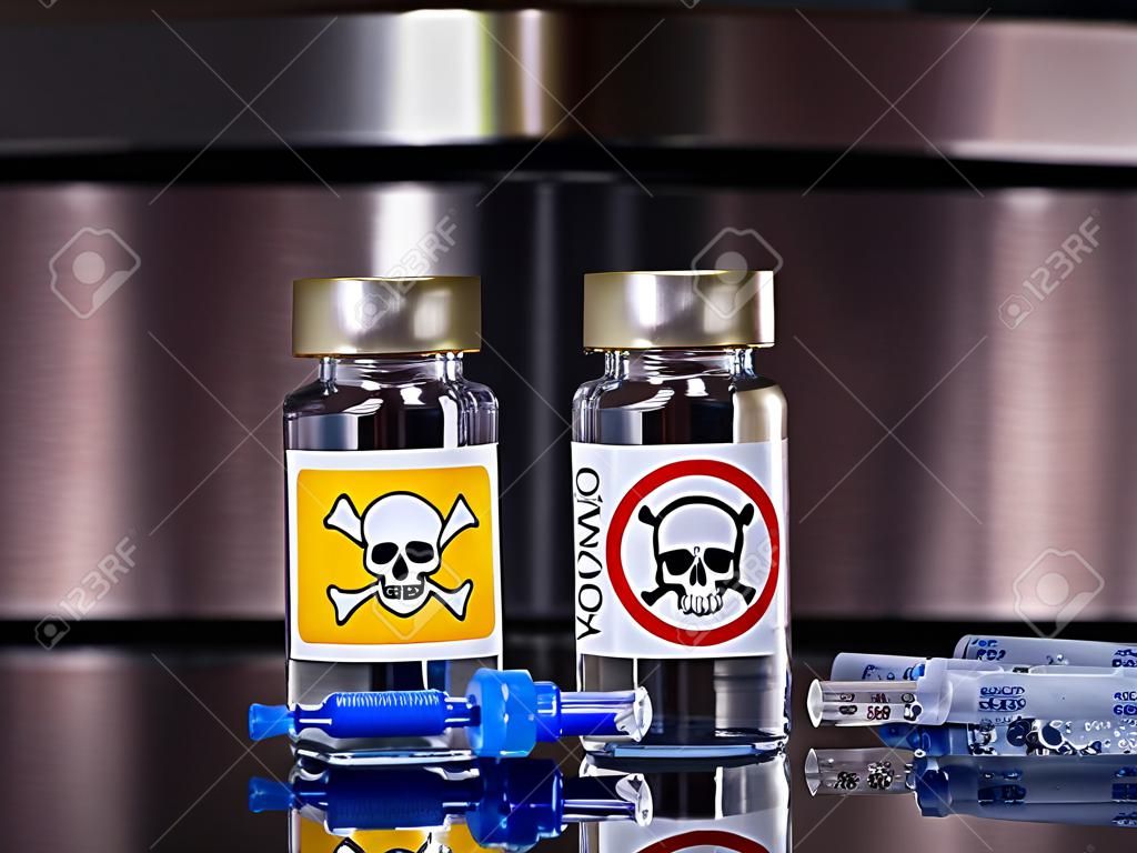 Two bottle one with a skull and one vial vaccine anti-vax activists covid-19 and syringe. Coronavirus covid-19 concept.