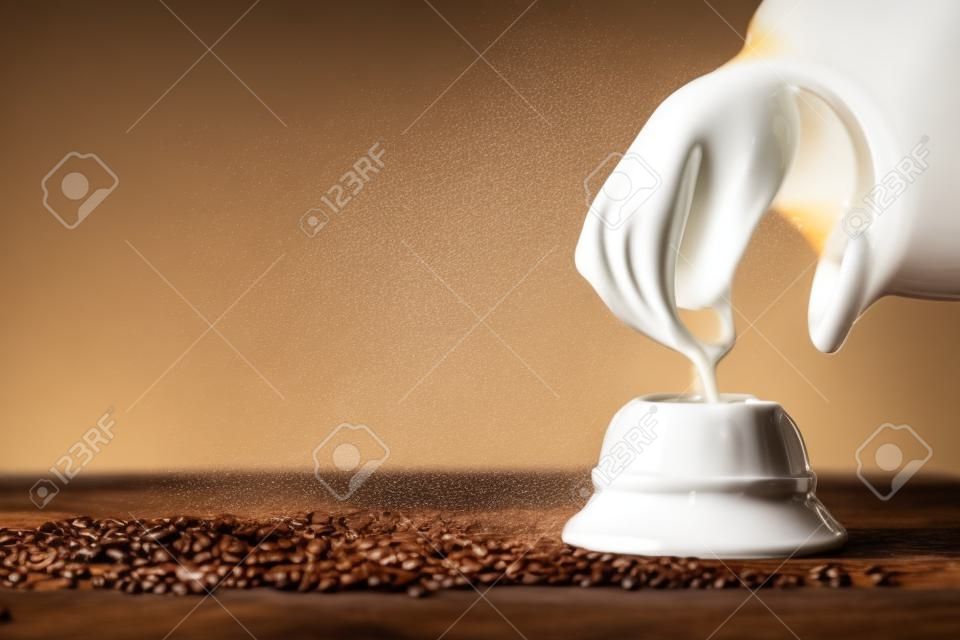 Coffee with milk mixed splashing