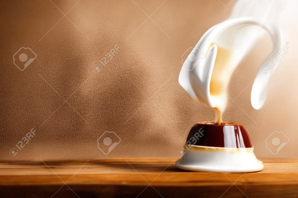 Coffee with milk mixed splashing