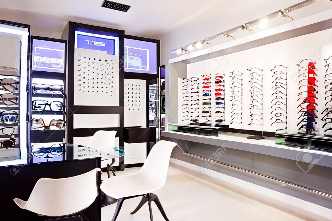 Selection of modern eyeglasses rims at optician's store