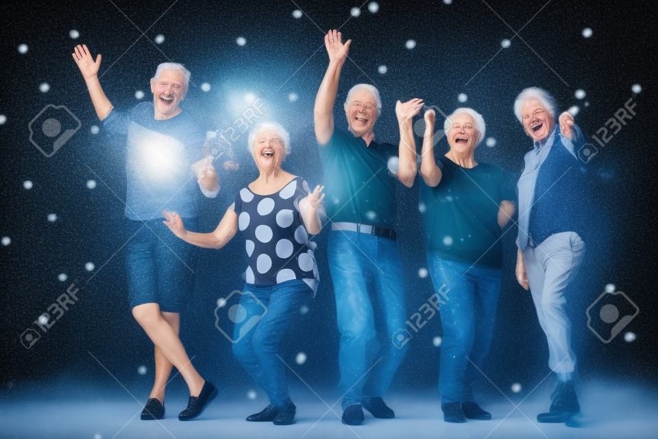 Happy elders having some fun at a New Year's Eve party