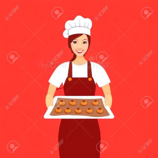 Giovane donna che cuoce l'illustrazione di vettore dei biscotti con pepita di cioccolato. Pasticcere che prepara i biscotti per il negozio di panetteria. Vassoio della holding della casalinga con il carattere dei biscotti a forma di cuore nella progettazione piana.