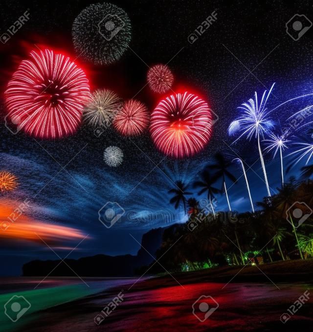 Beautiful fireworks above night tropical landscape with beautiful blue sky and stars. Thailand