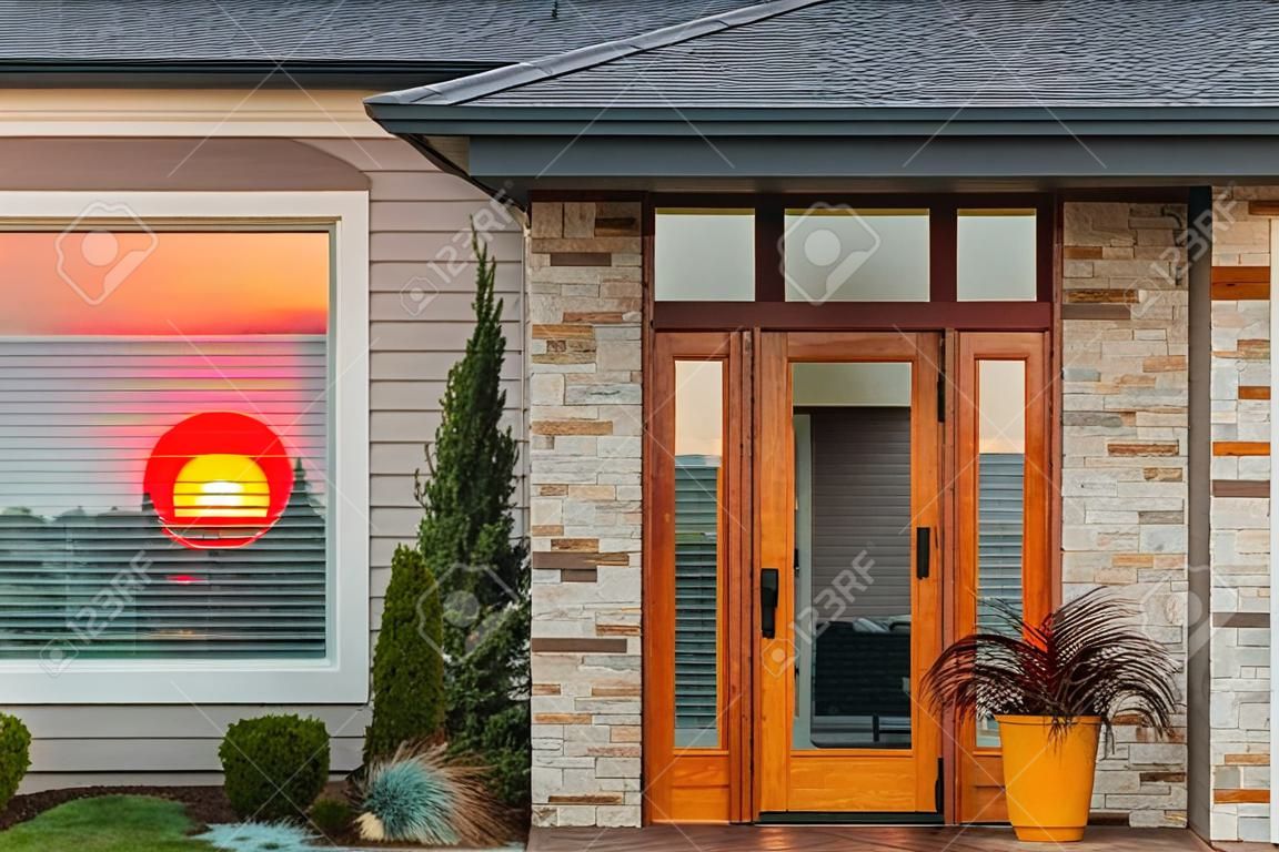 Home Exterior Detail with Reflection of Colorful Sunset