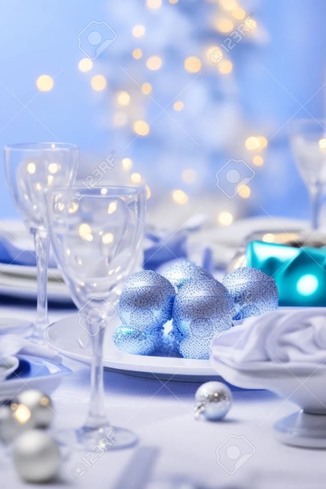 Place setting for Christmas in blue and white tone