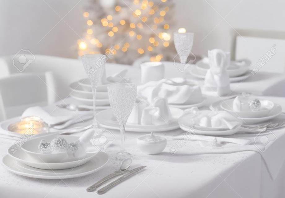 Place setting for Christmas in white tone