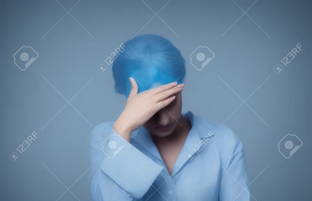 Model isolated with headache