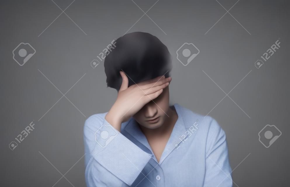 Model isolated with headache