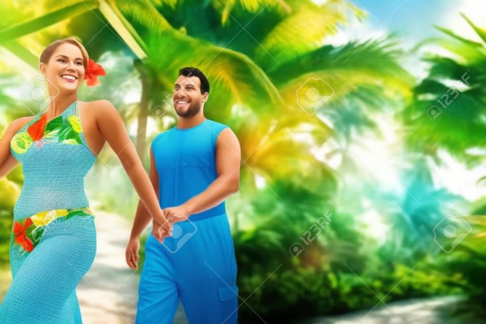 Couple walking on tropical path