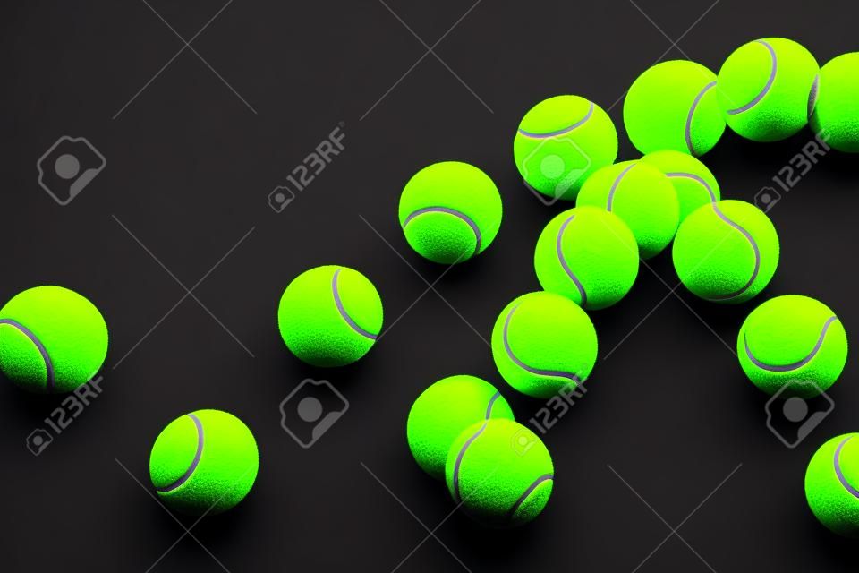 Movement or bounce of tennis ball isolated on black background.