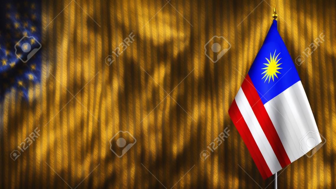 Pequeñas banderas de Malasia sobre un fondo borroso abstracto.