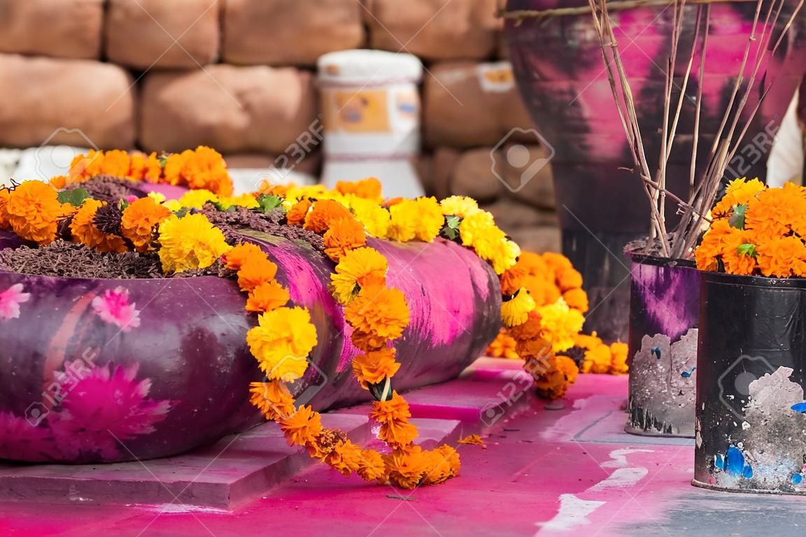 Saffron flower garlands and incense near Arambol temple, Goa, India