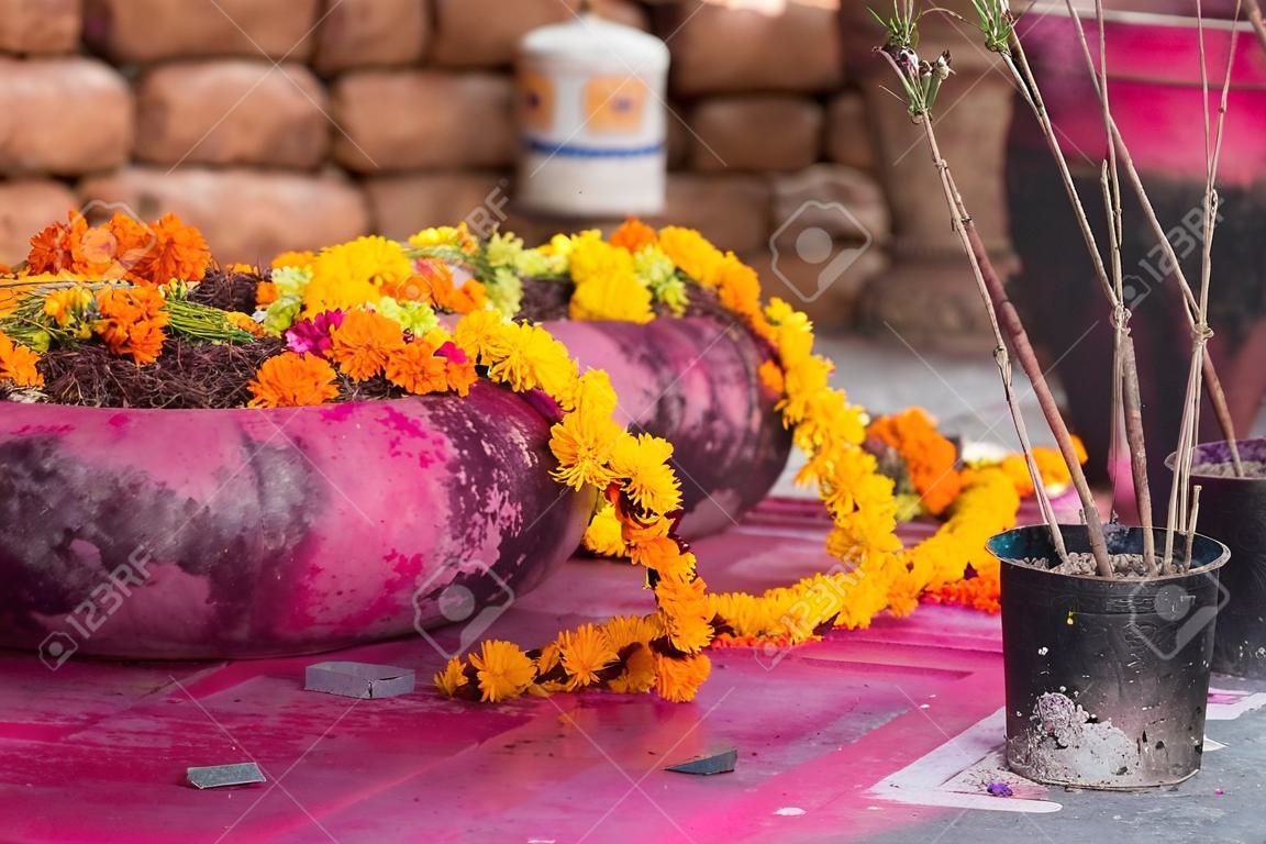 Saffron flower garlands and incense near Arambol temple, Goa, India