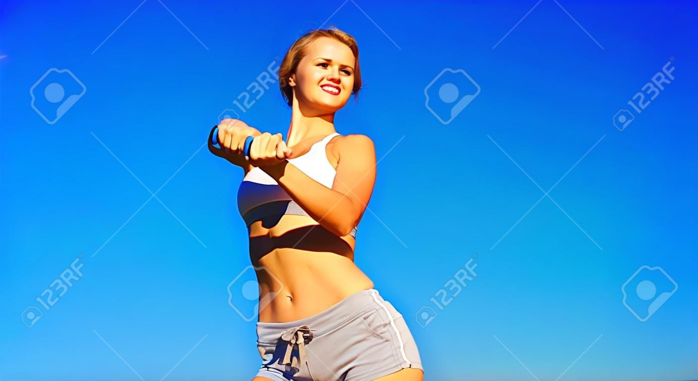 Fit young woman working out, from a complete series of photos.