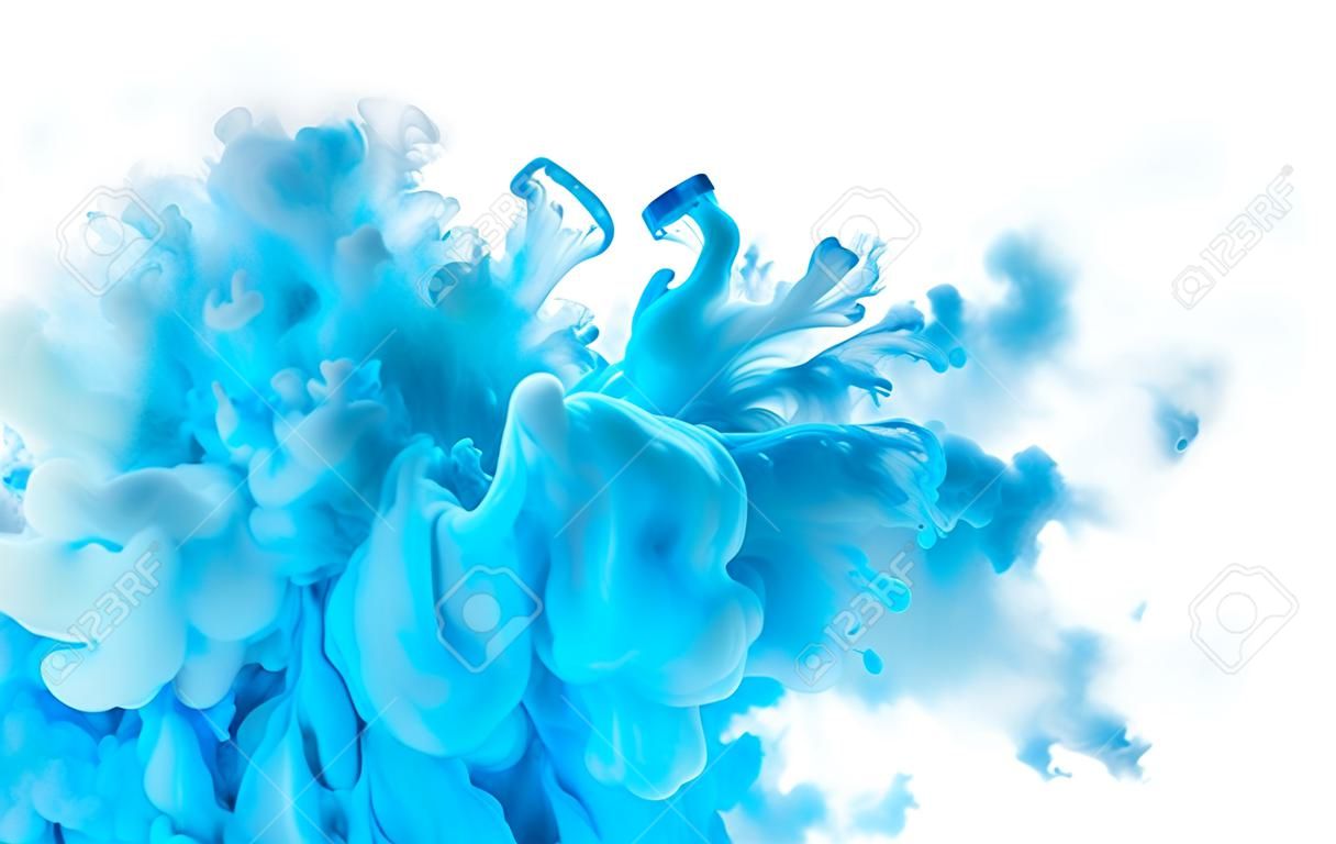 Color explosion. Closeup blue acrylic ink in water isolated on white with copy space for text