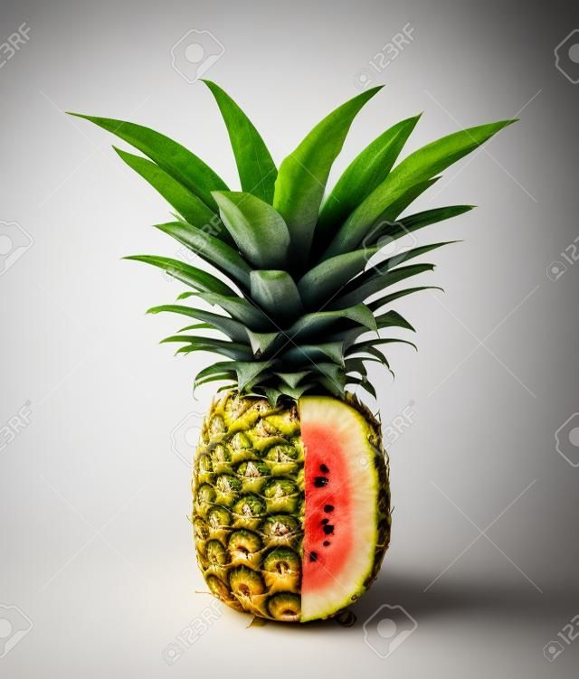 Pineapple with watermelon interior isolated in a white background