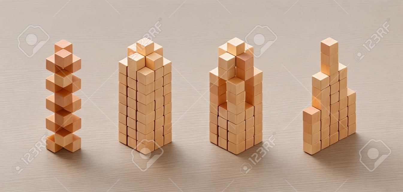 学習する子供のための等尺性の木製の立方体、白で隔離されたさまざまなタワーの木製の立方体のサンプル、就学前の子供たちの論理的なカウントのための3Dの立方体の木材、数理ゲームの子供のためのブロックの木製の正方形