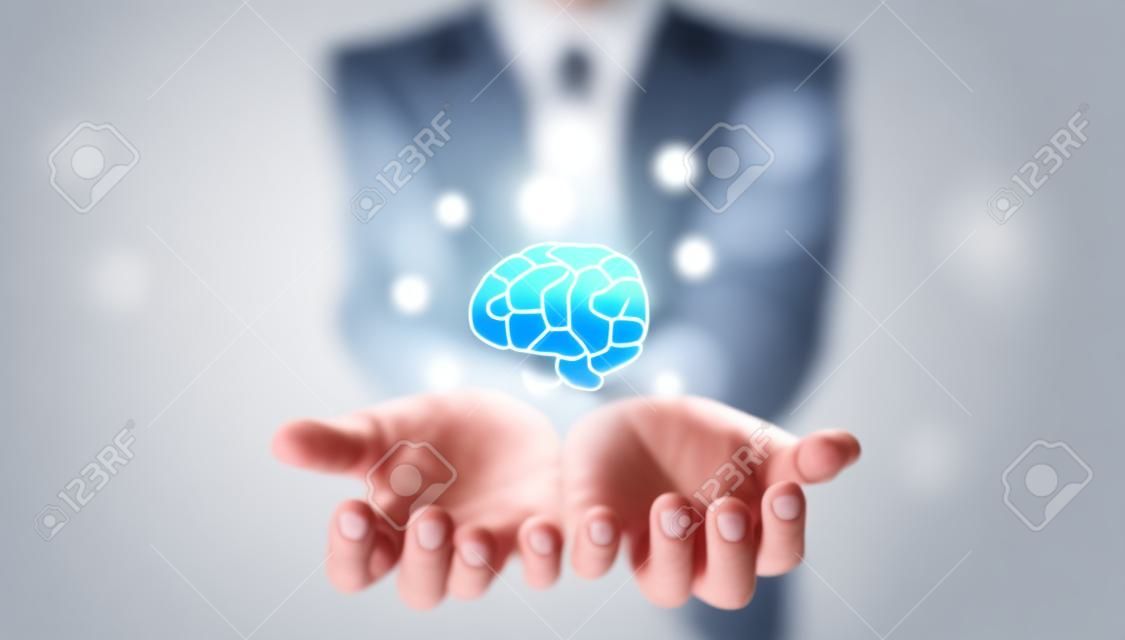 Businessman holding virtual brain icon for education, creative, thinking idea to solution success business.