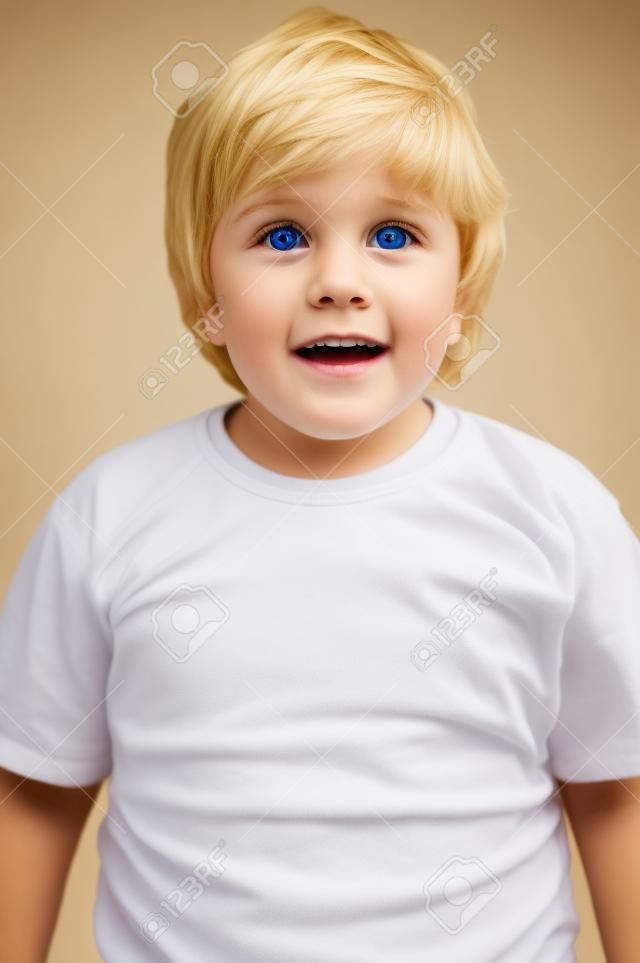 closeup portrait of cute blond kid boy