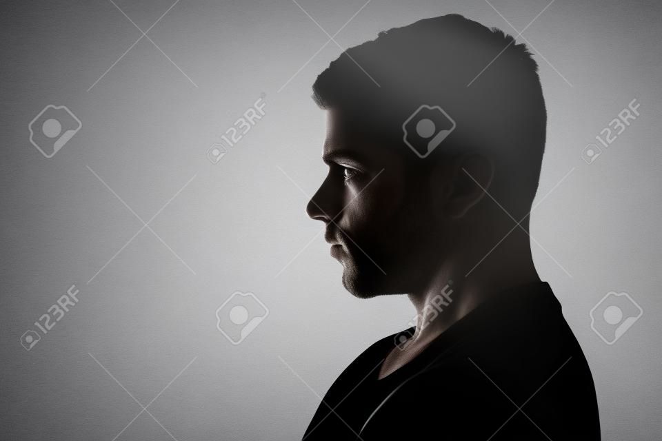 Obraz sylwetki muskularny mężczyzna w profilu na białym tle