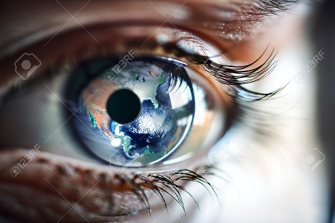 Macro photo of the womans eye and Earth planet