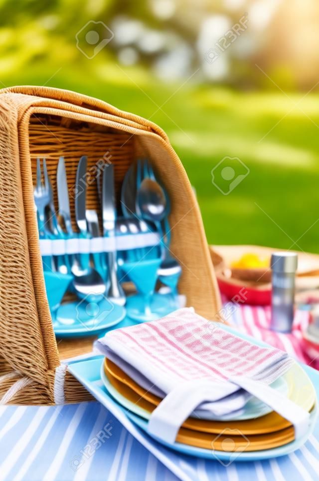 Closeup picture of a picnic bag (plates, silverware)