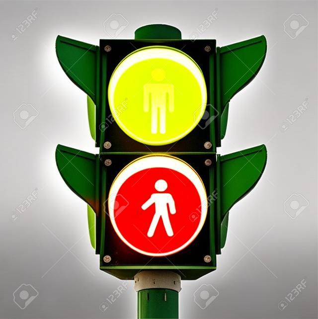 pedestrian traffic light sign with go and stop indicators on white