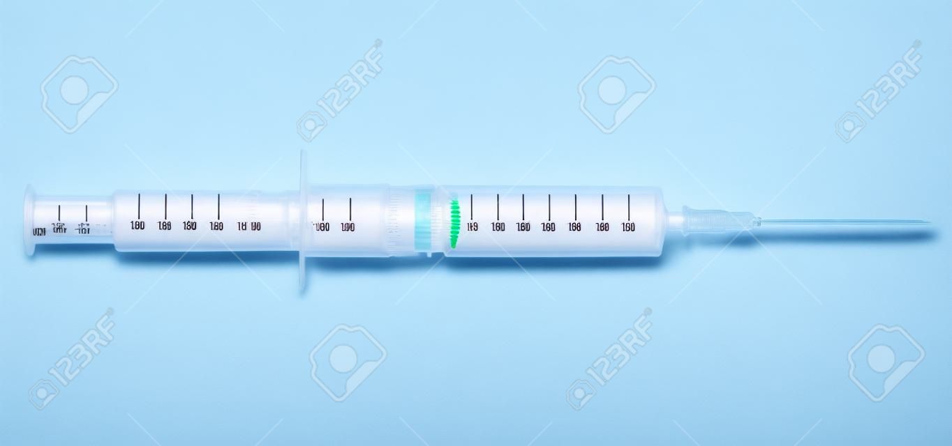syringe with medicine isolated on white