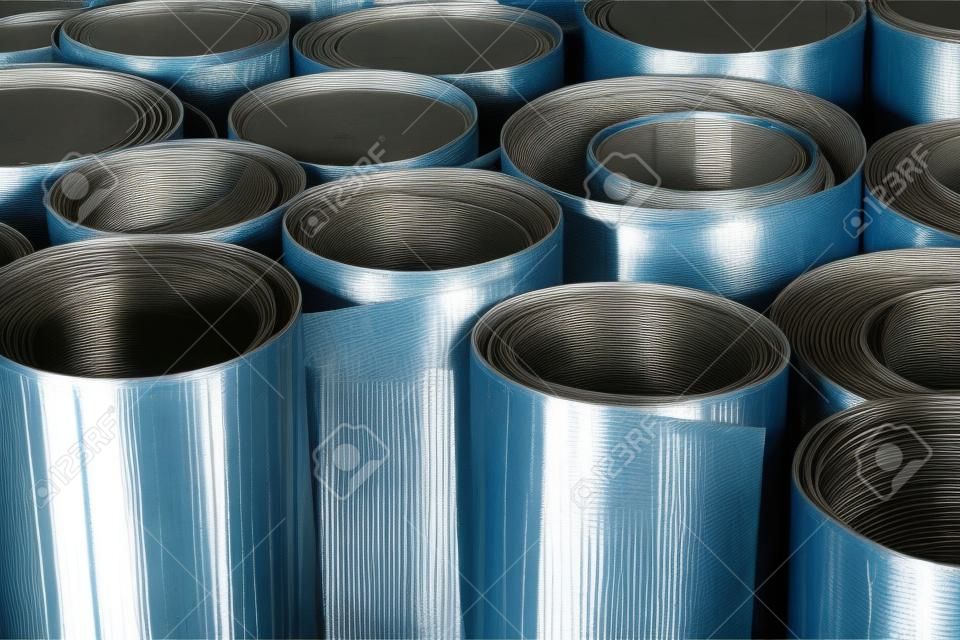 Rolls of flat galvanized metal sheets, building material
