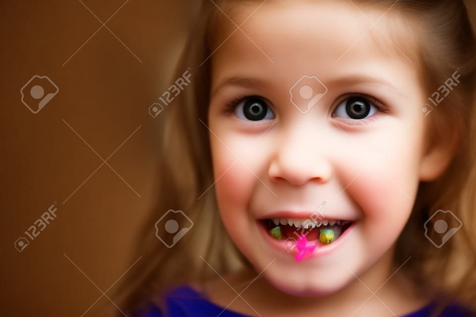 pretty little girl with ugly teeth (copy space left)