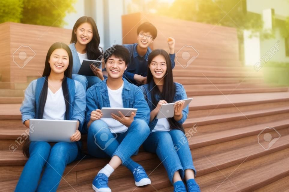 Group Of Happy Young Asian College Students In Casual Clothes.