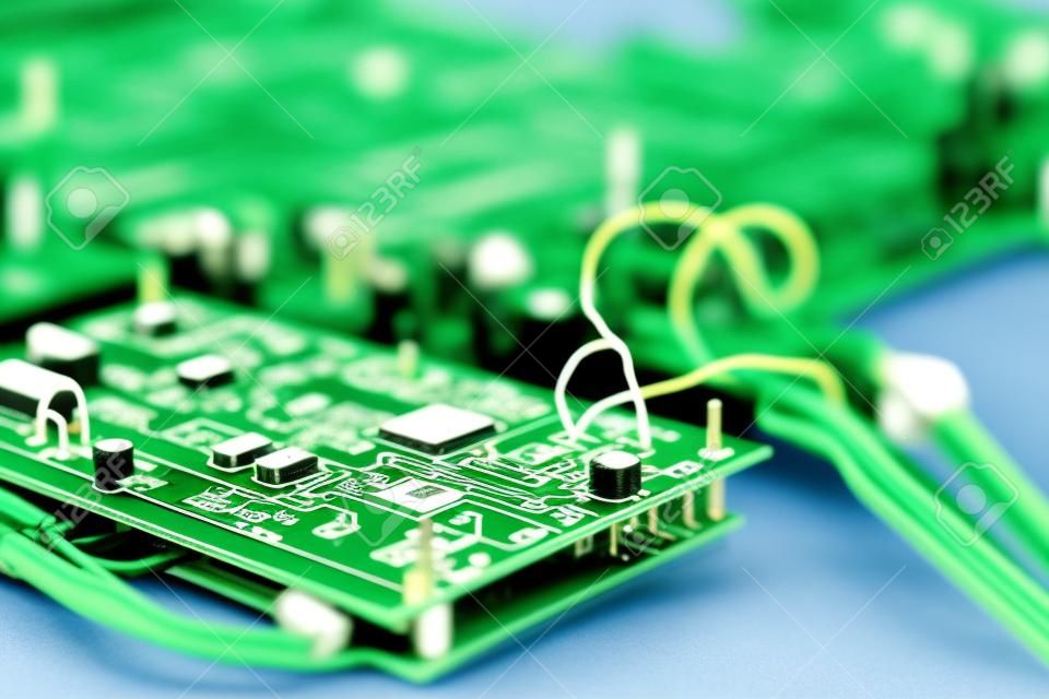 Printed Circuit Board with SMD Components. Placed with Connected Wire Probes During a Process of Tesing  in the Lab. Horizontal Image Composition