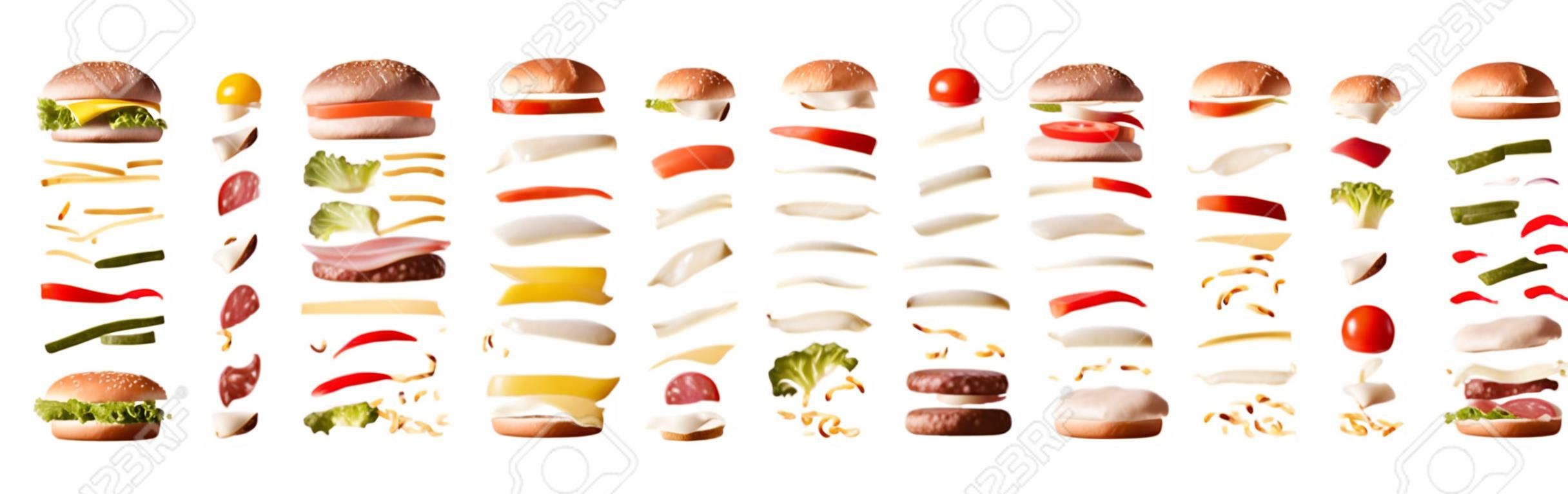 Satz verschiedene Burger mit Zutaten, die durch Schichten auf weißem lokalisiertem Hintergrund getrennt werden. Vorderansicht. Horizontale Komposition.